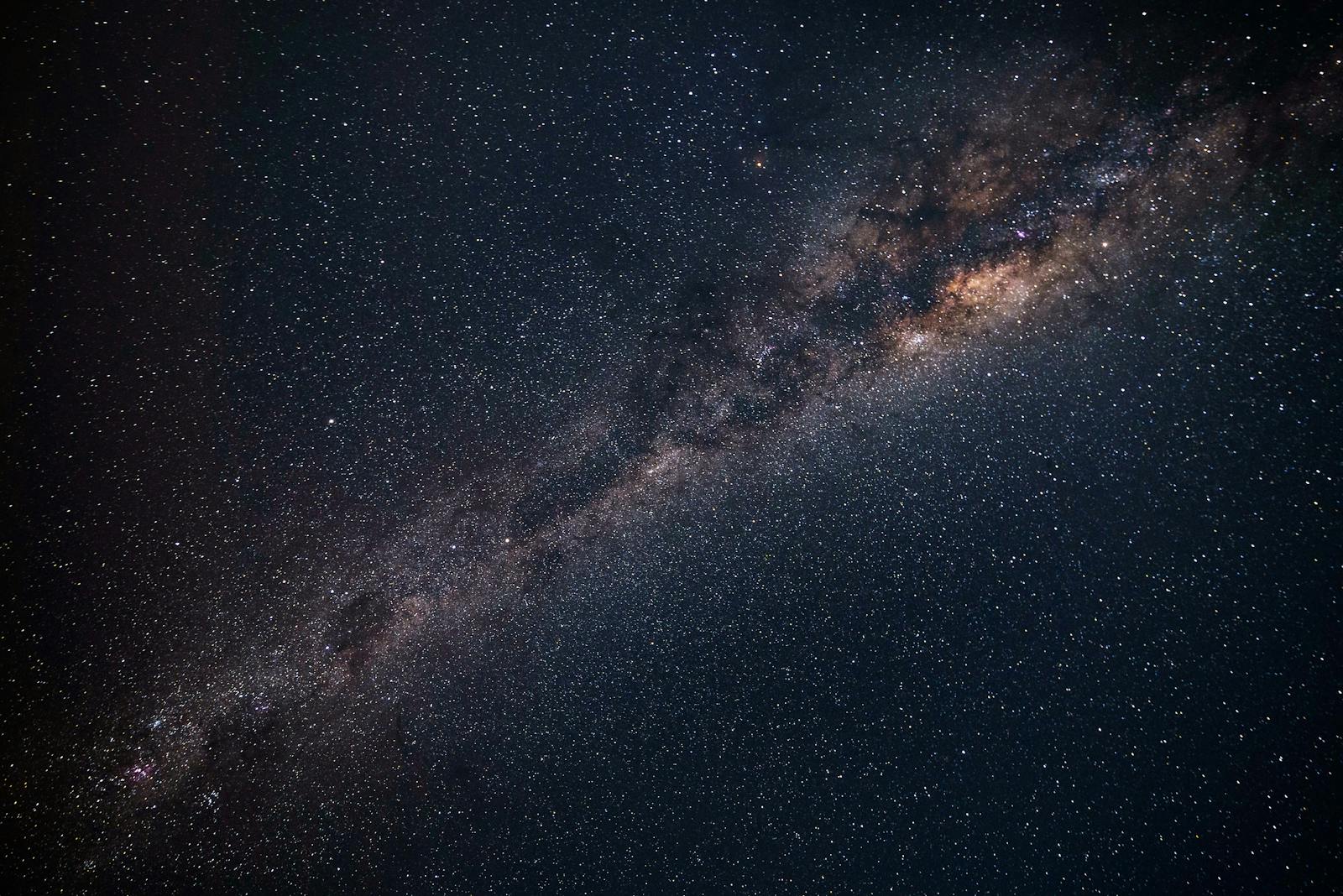 A breathtaking view of the Milky Way galaxy sparkling in the night sky over Punta Ballena, Uruguay.